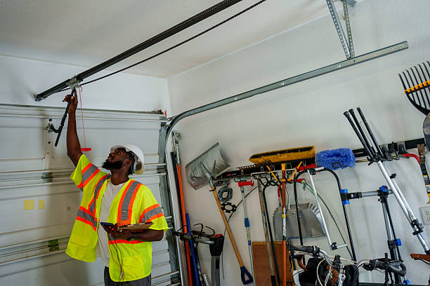 Professional Garage Door Installation technician working in Henderson, NC